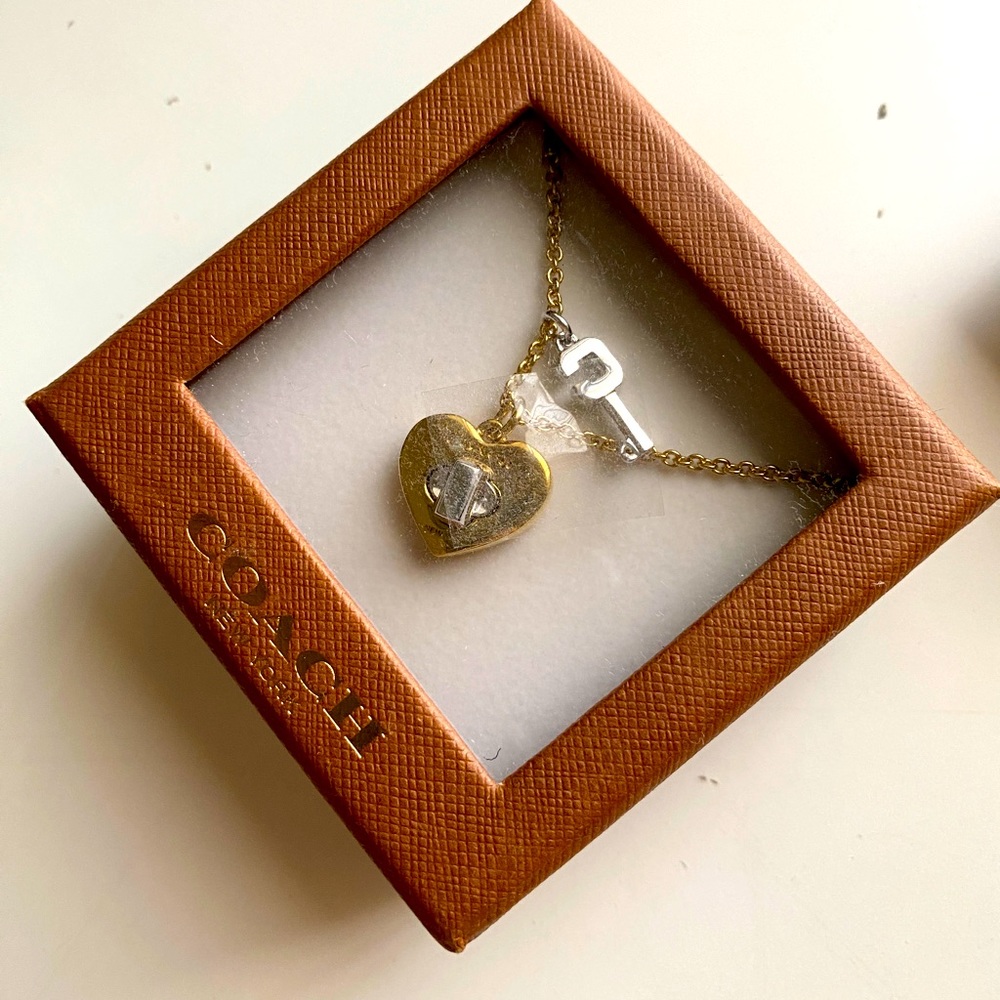 Coach heart necklaces